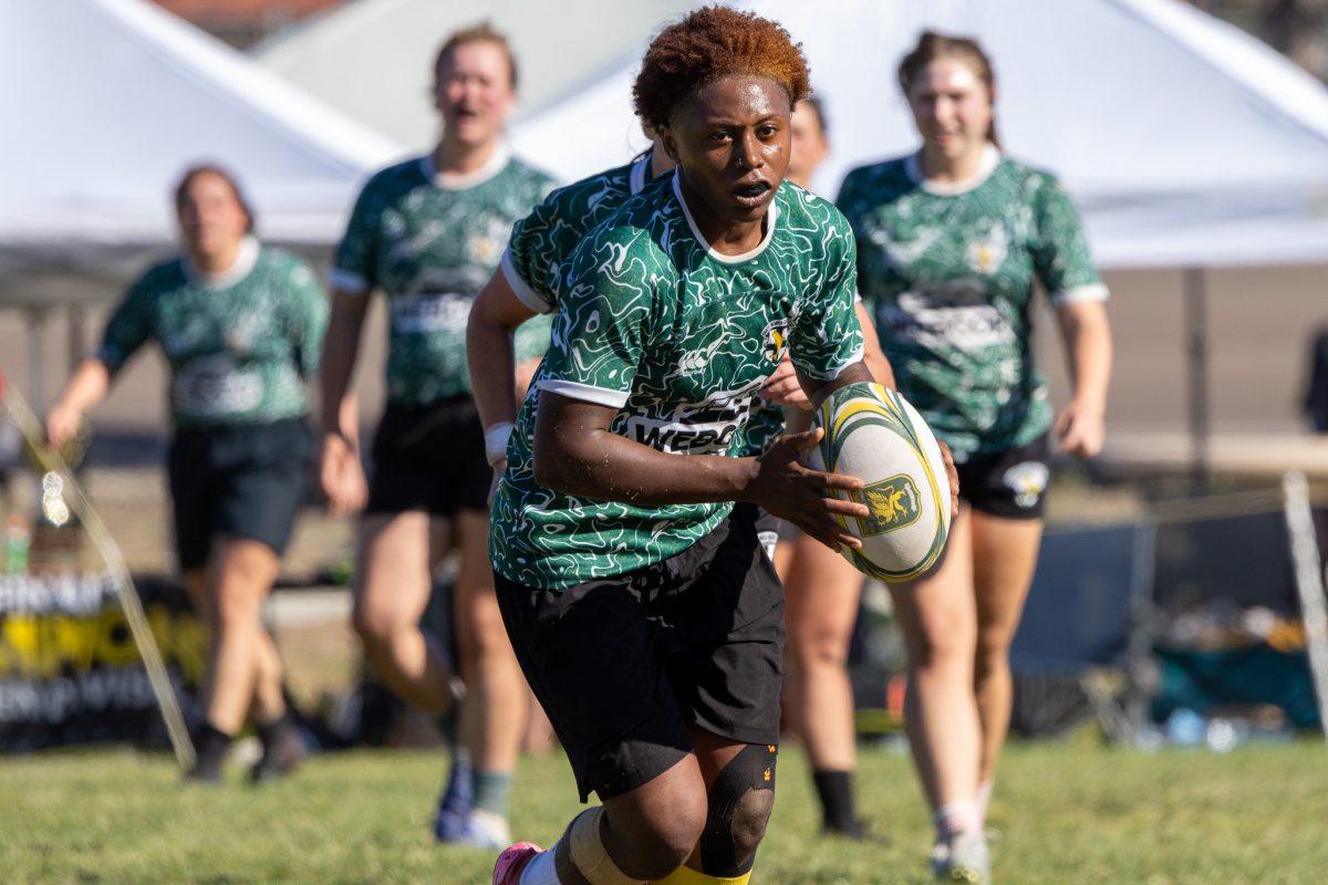 Player sprinting downfield with the ball
