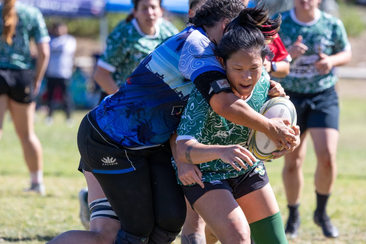 Rugby match action under the lights