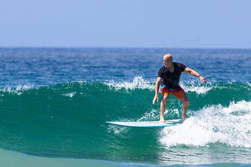 Clean right-hander with surfer in trim